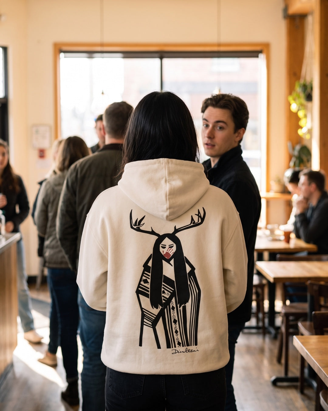 NI Avatar Ad 03 - Deer Woman hoodie noticed in coffee shop